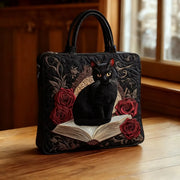 Women's bag with a black cat and books